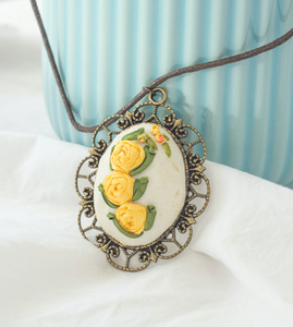 Embroidered Flower Pendant